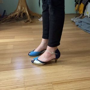 Turquoise, Silver, and Navy open toe heels.